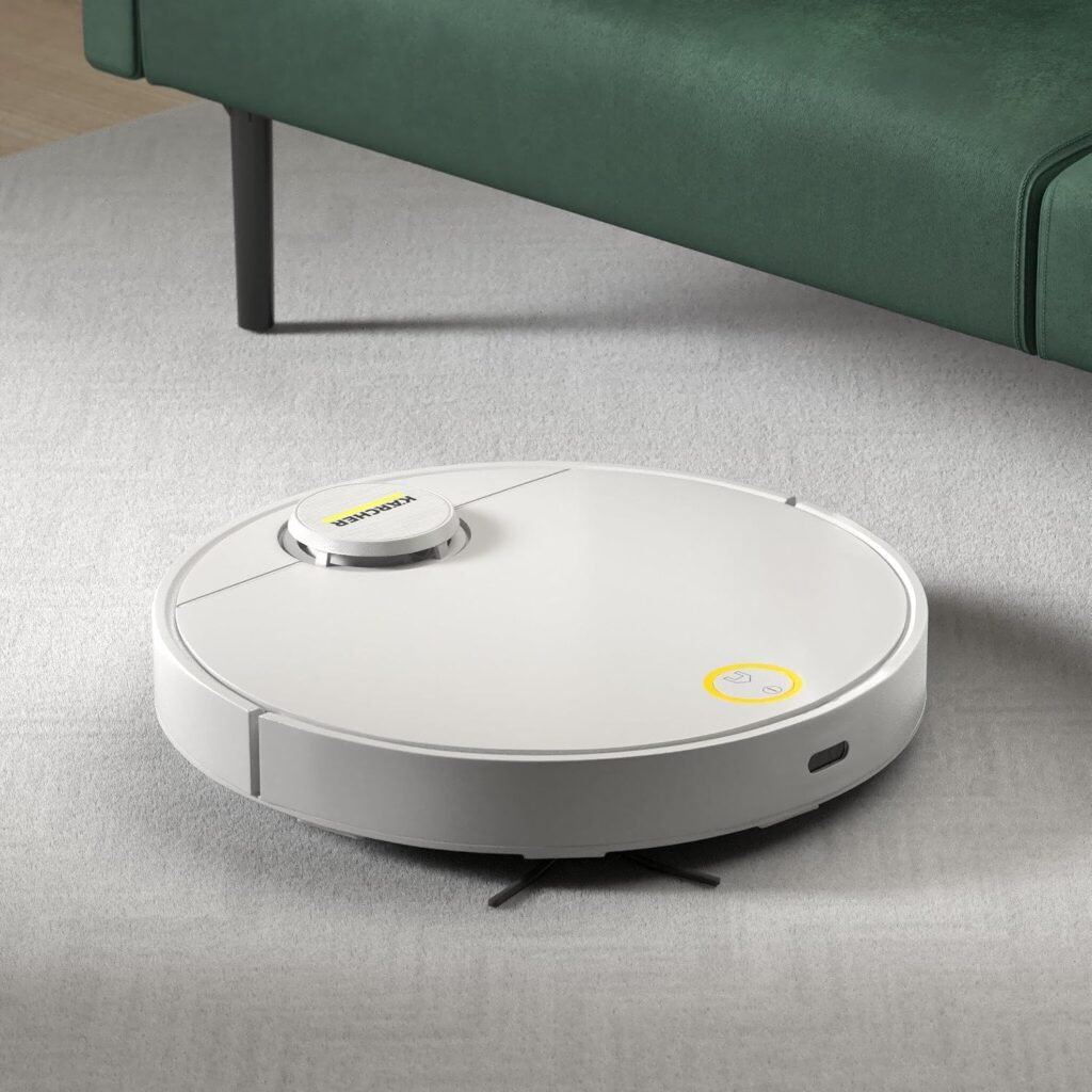 Kärcher RCV 3 : Robot au pied d'un canapé sur un tapis (photo fabricant)